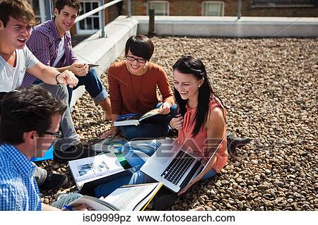 Colleagues working together on roof View Large Photo Image Stock Photo - Colleagues working together on roof. Fotosearch