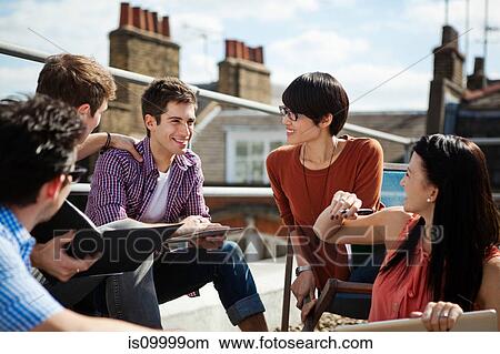 Picture - Group of people congratulating their friend. Fotosearch