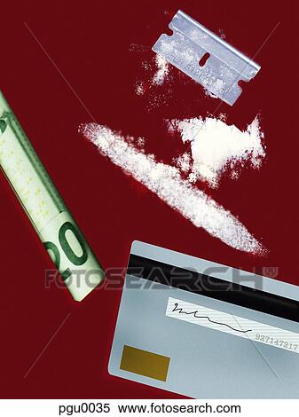 Credit card, dollar bill, razor and lines of cocaine View Large Illustration Stock Illustration - Credit card, dollar bill, razor and lines of cocaine. Fotosearch