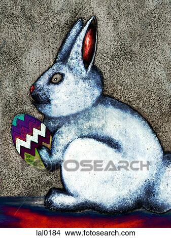 Stock Illustration - An Easter bunny holding an egg. Fotosearch