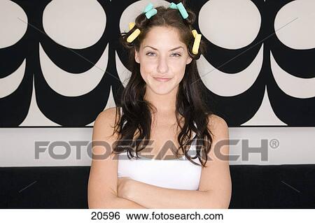 Young Woman With Her Hair In Rollers Stock Photograph 20596