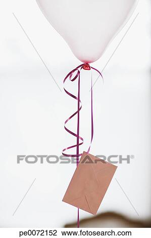 Stock Photo - Balloon with card attached to string. Fotosearch - Search Stock Photography, Print Pictures, Images, and Photo Clip Art