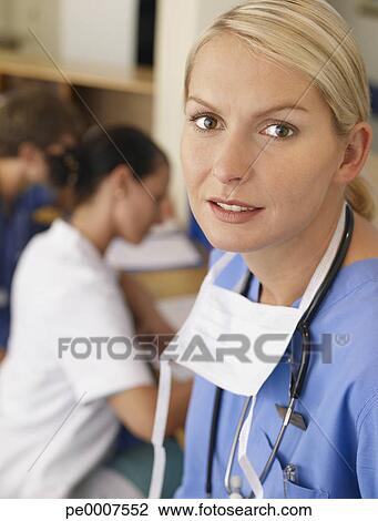 Stock Photo - Nurse smiling. Fotosearch - Search Stock Photography, Print Pictures, Images, and Photo Clip Art