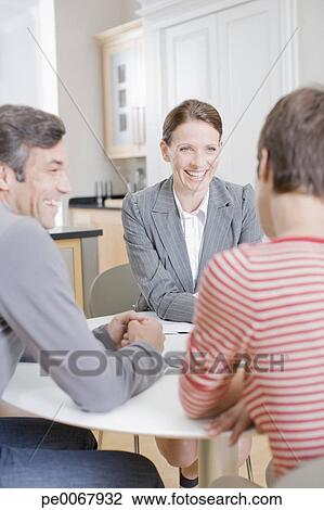 Stock Photo - Couple meeting with financial advisor. Fotosearch - Search Stock Photography, Print Pictures, Images, and Photo Clip Art