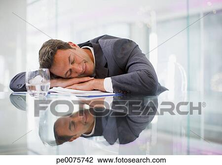 Businessman Sleeping At Desk In Office Stock Image Pe0075742