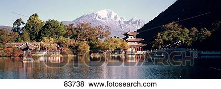 Black Dragon Pool and Moon Embracing Pavilion Lijiang China View Large Photo Image Stock Photo - Black Dragon Pool and Moon Embracing Pavilion Lijiang China. Fotosearch