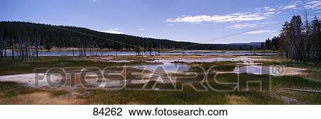 Stock Image - Firehole Lake Yellowstone National Park WY. Fotosearch