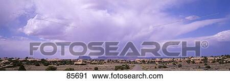 Stock Image - Storm Clouds Over Canyonlands National Park UT. Fotosearch