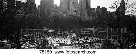 Stock Image - Wollman Rink Ice Skating Central Park New York NY. Fotosearch