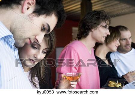 3 men and 2 women talking View Large Photo Image Stock Image - 3 men and 2 women talking. Fotosearch