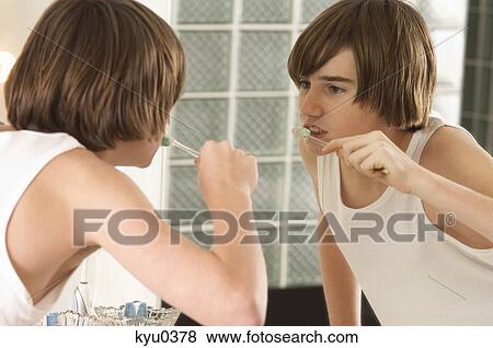 Boy brushing his teeth View Large Photo Image Stock Photo - Boy brushing his teeth. Fotosearch