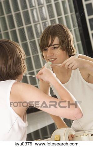 Boy brushing his teeth View Large Photo Image Stock Photo - Boy brushing his teeth. Fotosearch