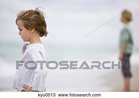 Boy on the beach View Large Photo Image Stock Image - Boy on the beach. Fotosearch