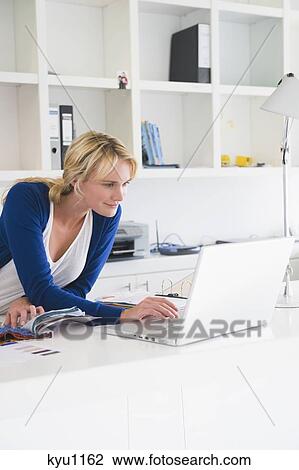 Businesswoman choosing color swatches View Large Photo Image Stock Image - Businesswoman choosing color swatches. Fotosearch