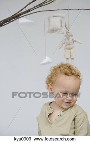 Close-up of a baby boy View Large Photo Image Stock Photo - Close-up of a baby boy. Fotosearch
