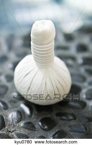 Close-up of a herbal compress ball View Large Photo Image Stock Image - Close-up of a herbal compress ball. Fotosearch