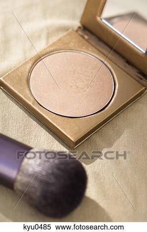 Close-up of a make-up brush with a powder compact View Large Photo Image Stock Photography - Close-up of a make-up brush with a powder compact. Fotosearch