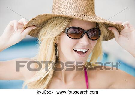 Close-up of a woman smiling View Large Photo Image Stock Photo - Close-up of a woman smiling. Fotosearch
