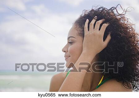 Stock Photography - Close-up of a woman smiling. Fotosearch