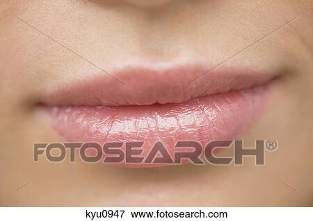 Close-up of a woman's lips View Large Photo Image Stock Photo - Close-up of a woman's lips. Fotosearch