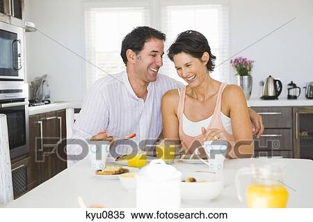 Stock Photography - Couple having breakfast. Fotosearch