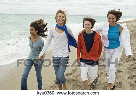 Family on the beach View Large Photo Image Stock Image - Family on the beach. Fotosearch
