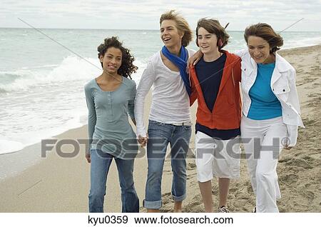 Stock Photo - Family on the beach. Fotosearch