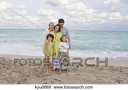 Family on the beach View Large Photo Image Stock Photo - Family on the beach. Fotosearch