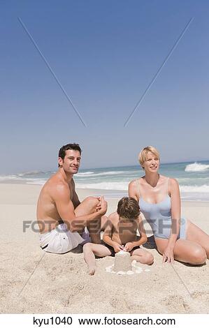 Family on vacations on the beach View Large Photo Image Stock Image - Family on vacations on the beach. Fotosearch