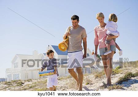 Family on vacations on the beach View Large Photo Image Stock Image - Family on vacations on the beach. Fotosearch