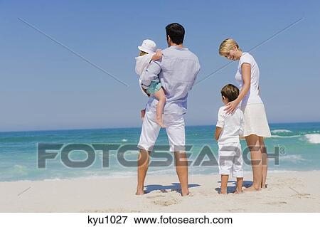 Family on vacations on the beach View Large Photo Image Stock Photo - Family on vacations on the beach. Fotosearch