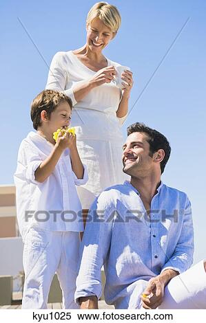 Family on vacations on the beach View Large Photo Image Stock Photography - Family on vacations on the beach. Fotosearch