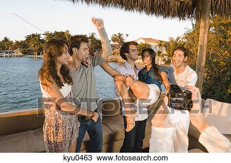 Friends having fun on vacation View Large Photo Image Stock Image - Friends having fun on vacation. Fotosearch