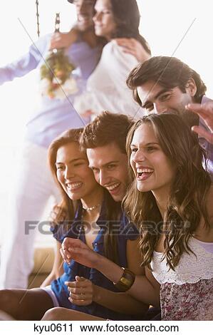 Stock Image - Friends having fun on vacation. Fotosearch