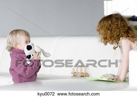 Little girl and little boy, face to face View Large Photo Image Stock Image - Little girl and little boy, face to face. Fotosearch