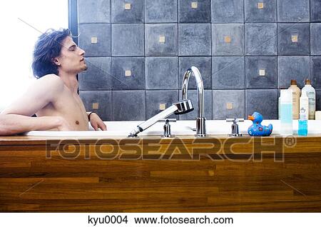 Man having a bath View Large Photo Image Picture - Man having a bath. Fotosearch