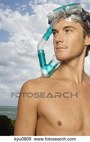 Man wearing a scuba mask View Large Photo Image Stock Photo - Man wearing a scuba mask. Fotosearch