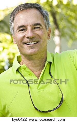 Portrait of a man smiling View Large Photo Image Stock Image - Portrait of a man smiling. Fotosearch