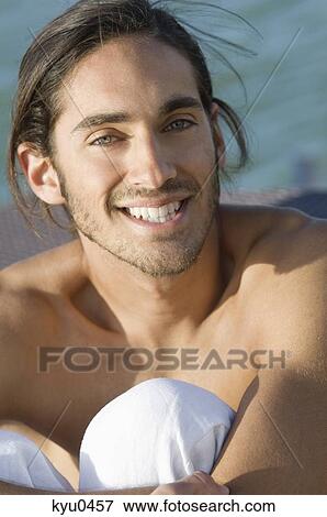 Stock Photo - Portrait of a man smiling. Fotosearch
