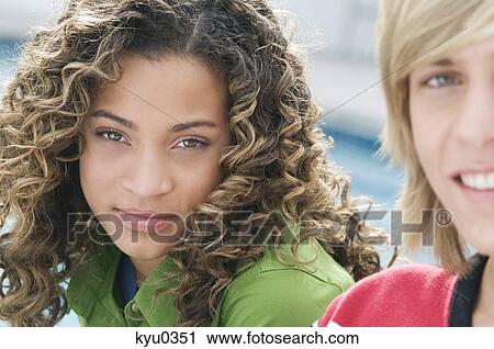 Portrait of a teenage boy and a girl View Large Photo Image Stock Image - Portrait of a teenage boy and a girl. Fotosearch