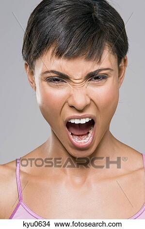Portrait of a woman shouting View Large Photo Image Picture - Portrait of a woman shouting. Fotosearch