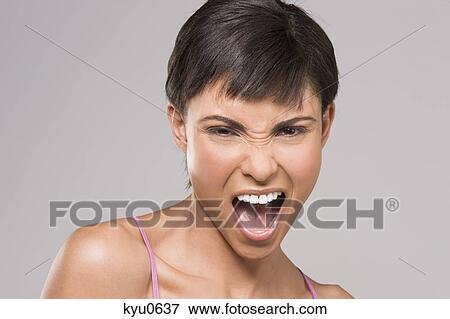 Portrait of a woman shouting View Large Photo Image Stock Photo - Portrait of a woman shouting. Fotosearch