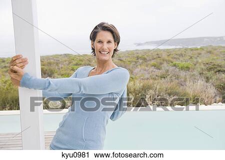 Portrait of a woman smiling View Large Photo Image Stock Image - Portrait of a woman smiling. Fotosearch