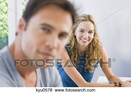 Stock Photo - Portrait of a woman smiling. Fotosearch