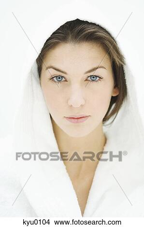 Portrait of a young woman with bathrobe View Large Photo Image Picture - Portrait of a young woman with bathrobe. Fotosearch
