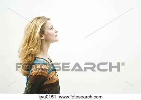 Stock Image - Portrait of a young womanin profile. Fotosearch