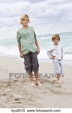 Portrait of two boys on the beach View Large Photo Image Stock Image - Portrait of two boys on the beach. Fotosearch