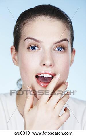 Portrait of young surprised woman View Large Photo Image Stock Photo - Portrait of young surprised woman. Fotosearch
