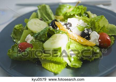 Stock Photo - Vegetable salad served in a plate. Fotosearch
