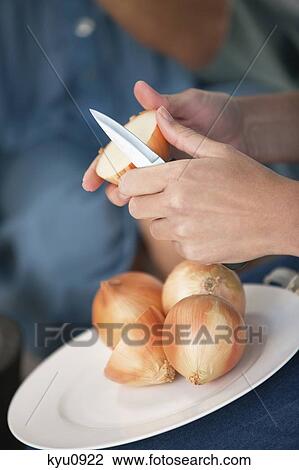 Woman chopping onions View Large Photo Image Stock Image - Woman chopping onions. Fotosearch